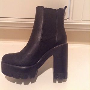 Black boots. Size 6.  About 3 inch chunky heel.
